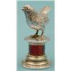 Image 1 : A George V novelty parcel gilt silver desk seal modelled as a bird perched upon a red enamelled p...