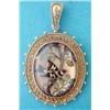 Image 1 : A Victorian reverse intaglio crystal pendant depicting a bull-finch amongst oak leaves, the locke...