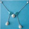 Image 1 : A Child & Child Art Nouveau pendant necklace with pale blue and green enamelled winged motif set...