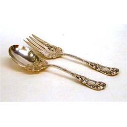 SUPERB STERLING SILVER SALAD FORK AND SPOON American. Circa 1900. Maker: Durgin. In the "Magnolia...