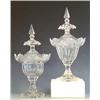 Image 1 : PAIR OF CUT GLASS URNS AND COVERS Probably Irish. 19th Century. Each with paneled body, faceted s...