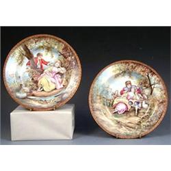 PAIR OF LIMOGES ENAMEL WALL PLATES French. Early 20th Century. Painted by H.T. Monogrammed. Each...