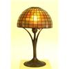 Image 1 : TIFFANY STUDIOS FAVRILE GLASS AND BRONZE DESK LAMP American. 1899-1918. The domical geometric sha...