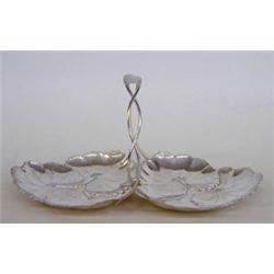 STERLING SILVER SWEET MEAT DISH American. 20th Century. Maker: Reed & Barton. Designed with two s...