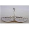 Image 1 : STERLING SILVER SWEET MEAT DISH American. 20th Century. Maker: Reed & Barton. Designed with two s...