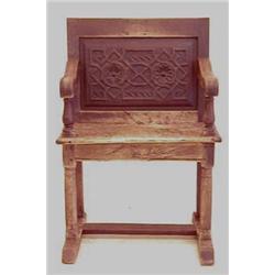 RENAISSANCE STYLE CARVED OAK ARM CHAIR Spanish. Late 19th Century. The rectangular paneled back w...