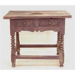 RENAISSANCE OAK WORK TABLE Flemish. 17th Century. The rectangular top above two paneled frieze dr...