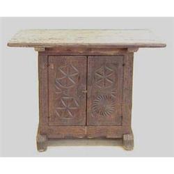 RENAISSANCE STYLE CARVED OAK SIDE CABINET Spanish. 18th Century. The rectangular top above the ca...