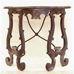 GOOD PAIR OF RENAISSANCE WALNUT AND WROUGHT IRON CONSOLE TABLES Spanish. 18th Century. Each shape...