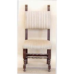 SET OF FOUR BAROQUE WALNUT SIDE CHAIRS Italian. 18th Century. Each rectangular padded backrest wi...