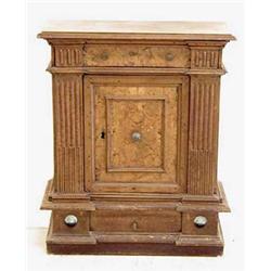 RENAISSANCE WALNUT AND BURL CREDENZA Italian. 18th Century. The rectangular molded top above a lo...