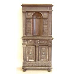 RENAISSANCE CARVED WALNUT SIDE CABINET Italian. 18th Century. In two parts. The upper with dentil...