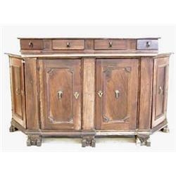 RENAISSANCE WALNUT CREDENZA Italian. 17th/18th Century. The rectangular top with canted corners s...