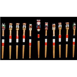 11 Northwest Coast Gambling Sticks, Carved and Painted 9" L.  Fine Condition