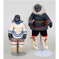 Two Inuit Dolls with Carved Soapstone Faces Dressed in Traditional Attire 10 1/2" H. and 13 1/2" H. 