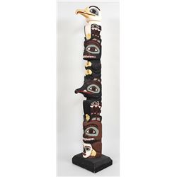 Totem Carved with Eagle, Bear, Thunderbird and Bear Mother Design by Jeffries 64" H. 13" W. Base Goo