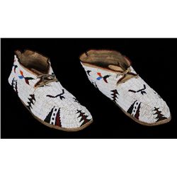 Pair of Cheyenne Fully Beaded Moccasins with Geometric Design and Parfleche Soles ca. 1900  11 3/4" 