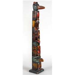 Northwest Coast Totem Carved with Four Figures ca. 1920's  26 1/2" H. 4 1/2" W. Base  Good Condition