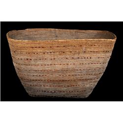Lillooet Coiled Burden Basket 20" L. 16 1/2" W. 12 1/2" H.  Good Condition with Rim Loss  Fine Condi