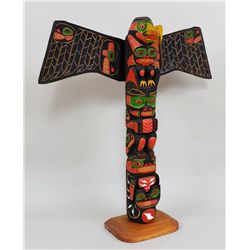 Totem Carved with Three Figures by A.E. Cecil 43" H. 40" W.  Good Condition