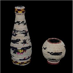 Nuu-chah-nulth Basketry Covered Bottle with Eagle and Whaler Design 8" H. 3" D.  Good Condition and 