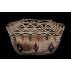 Lillooet Coiled Basket with Diamond Imbricated Design 13 1/2 " L. 6" W. 8 1/2" H.  Good Condition wi