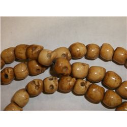 Strand of Carved Bone Skull Necklace