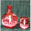 Image 1 : A Cranberry glass carafe with beaker, each with Mary Gregory style painted...