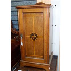 Late 19th Century Arts & Crafts design walnut bedside cupboard having a short inlaid back panel a...