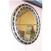 Image 1 : 19th Century Irish oval mirror, the black and gilt frame decorated with glass cabochons, 1'11" x...