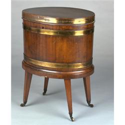 George III oval brass bound mahogany cellaret with hinged cover enclosing a zinc lined interior s...