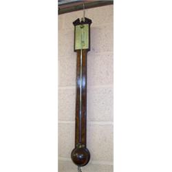 George III mahogany stick barometer having a moulded broken arch pediment with urn shaped brass f...