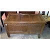 Image 1 : 17th Century oak coffer having a triple fielded panelled lid, rosette design carved frieze, the t...