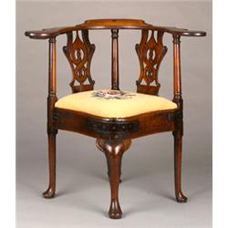 George III oak 'corner' chair with wide scroll arms, pillar upright supports between the pierced...