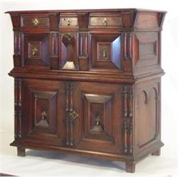 Late 17th Century oak and walnut enclosed chest, the upper section with a moulded edge fitted one...