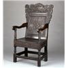 Image 1 : 17th Century oak joined arm chair, the crest with central urn of flowers flanked by a pair of bir...