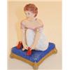 Image 1 : 19th Century Bloor Derby figure depicting a young girl seated on a cushion whilst tying her bootl...