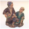 Image 1 : Two Japanese earthenware groups, each depicting two seated male figures, impressed character mark...
