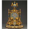 Image 1 : 19th Century French mantel clock, the gilt metal case with urn shaped finial and having inset SŠv...