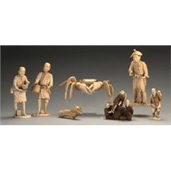 Japanese carved ivory Okimono depicting a farmer holding a bird, 7" high - see illustration Est.:...