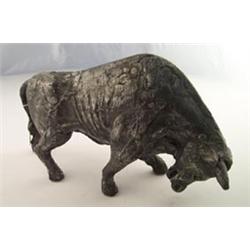 Contemporary cold cast figure of a bull, signed W.M., 14  long Est.: £40 - £60...