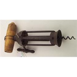 19th Century steel corkscrew having turned bone handle and open cylinder Est.: £60 - £90...