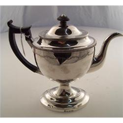 George III urn shaped coffee pot with engraved decoration and ebonised scroll shaped handle, Shef...