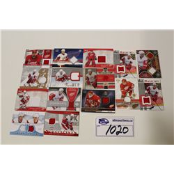LOT OF 15 DETROIT RED WINGS AUTHENTIC MEMORABILIA CARDS INCLUDING: P. DATSYUK, N. LIDSTROM, J.