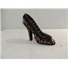 Image 1 : STYLIZED HIGH HEEL SHOE 8 RING KEEP.
