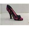 Image 1 : STYLIZED HIGH HEEL SHOE 8 RING KEEP.