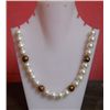 Image 1 : 442.45 Ct Peral Necklace with 4 Metal Stones in Between
