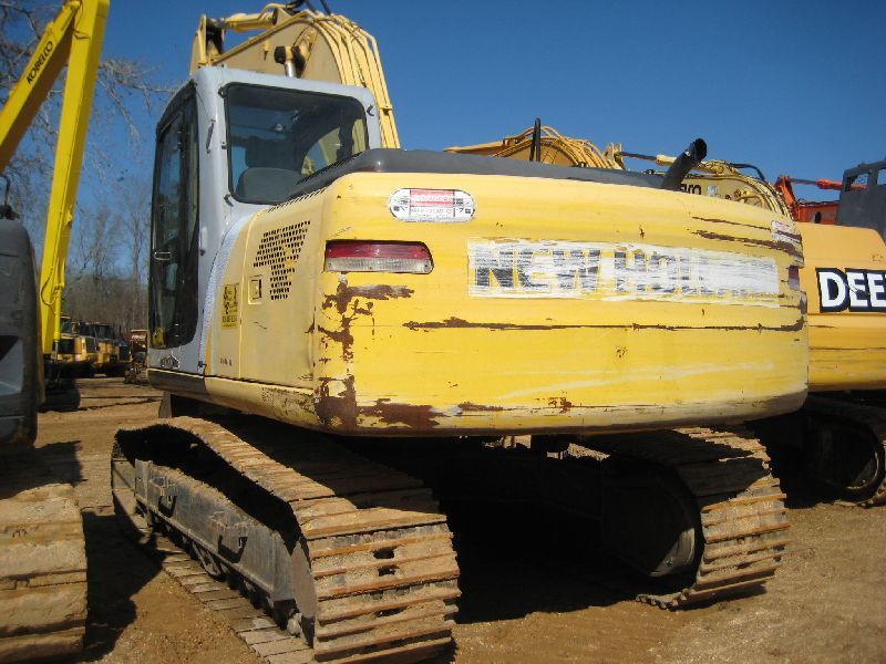 NEW HOLLAND EH160 HYDRAULIC EXCAVATOR, S/N N6DA16247, LONG STICK, ROCKLAND THUMB, ECAB W/AIR