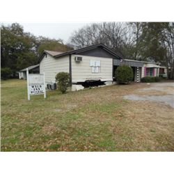 COMMERCIAL LOT1200 sq ft building, 1 bath, former Beauty Shop: located 701 Dozier St, Prattville, AL