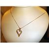 Image 1 : Ladies 14kt Heart Necklace with 8 Diamonds